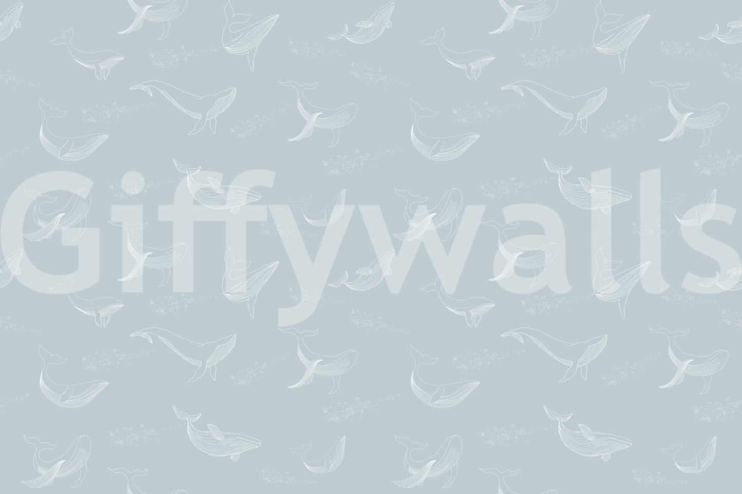 Coastal style whale wall decor for an apartment hallway.