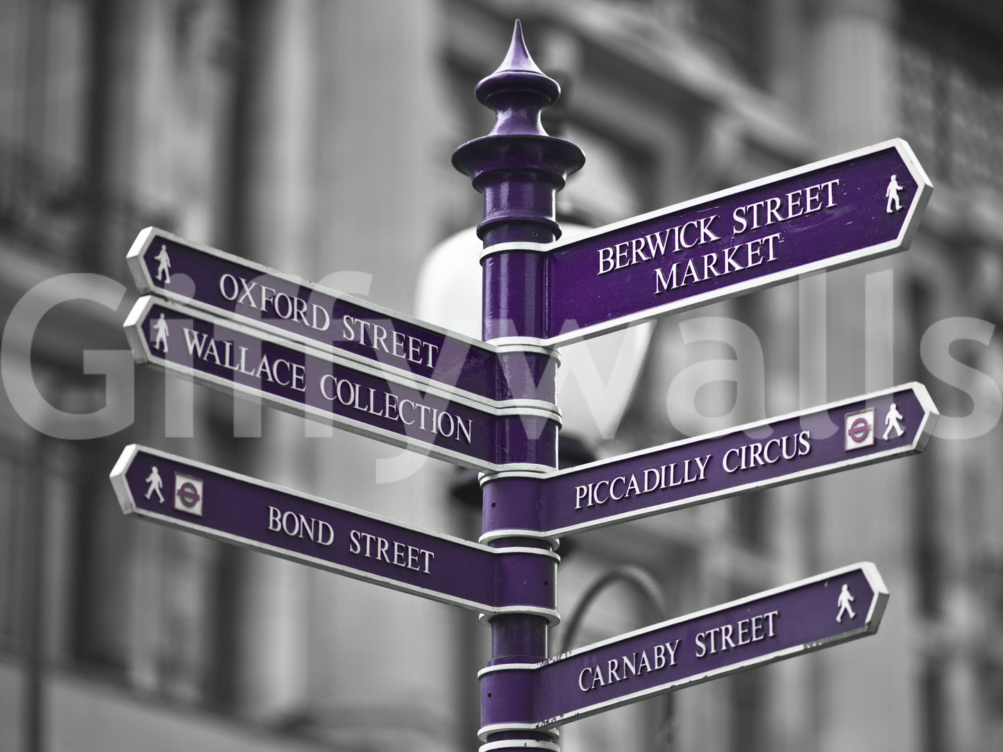 The wallpaper presents a vibrant Oxford Circus signpost standing out against a soft-focus architectural backdrop.