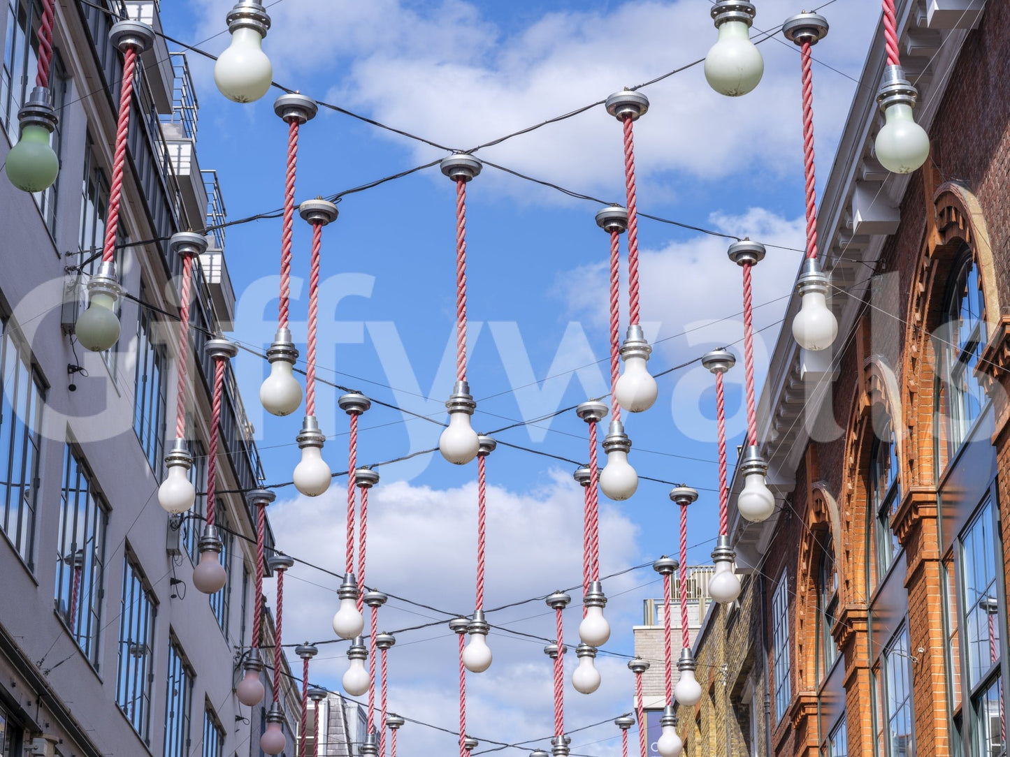 Contemporary Urban Hanging Lights Wall Mural with hanging bulb design.