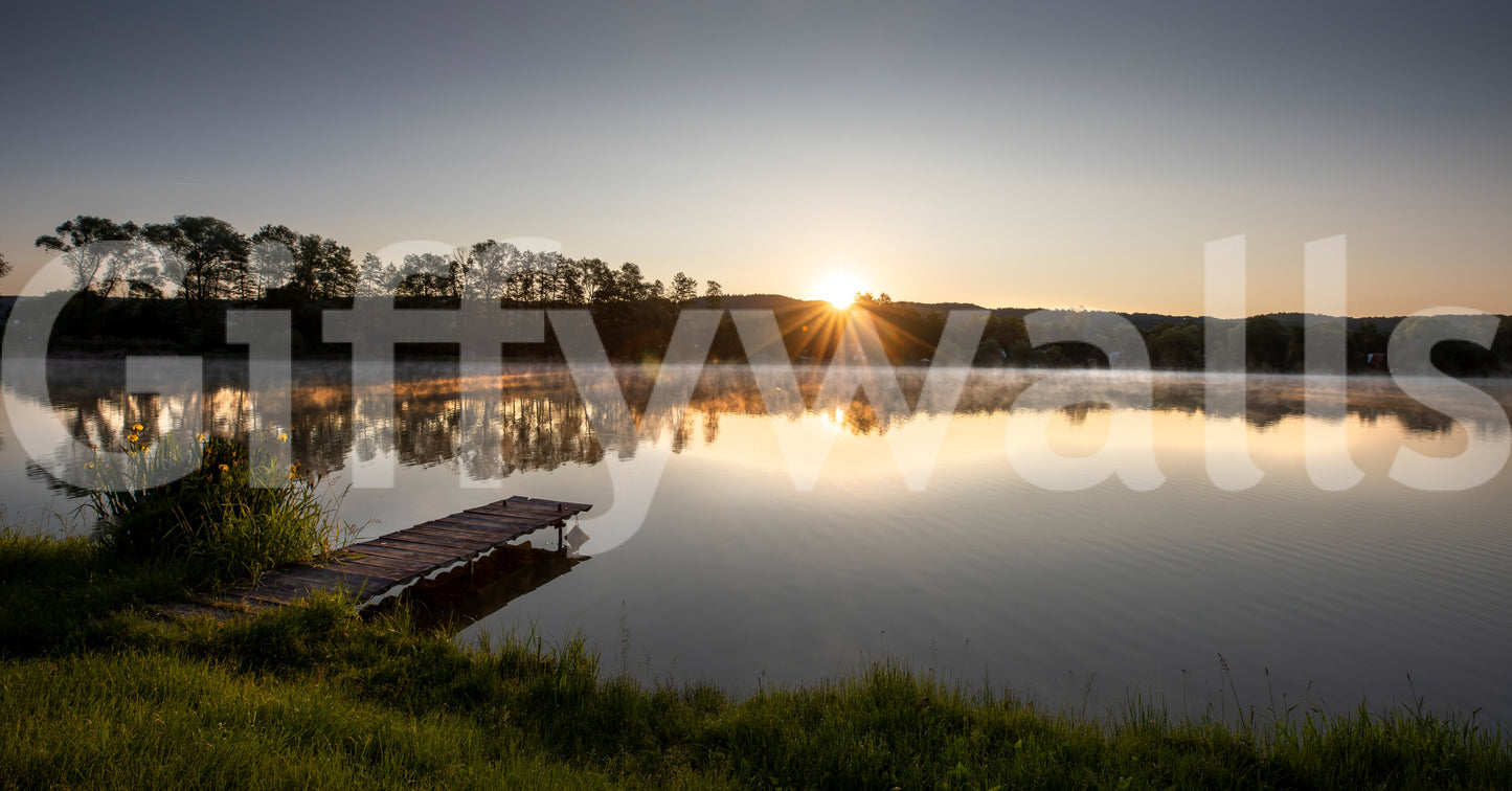 Tranquil Sunrise Reflection Over Serene Lake Wall Mural