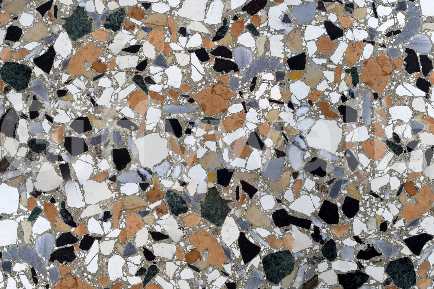 Abstract segmented Terrazzo Mix mural brings architecture indoors gracefully.