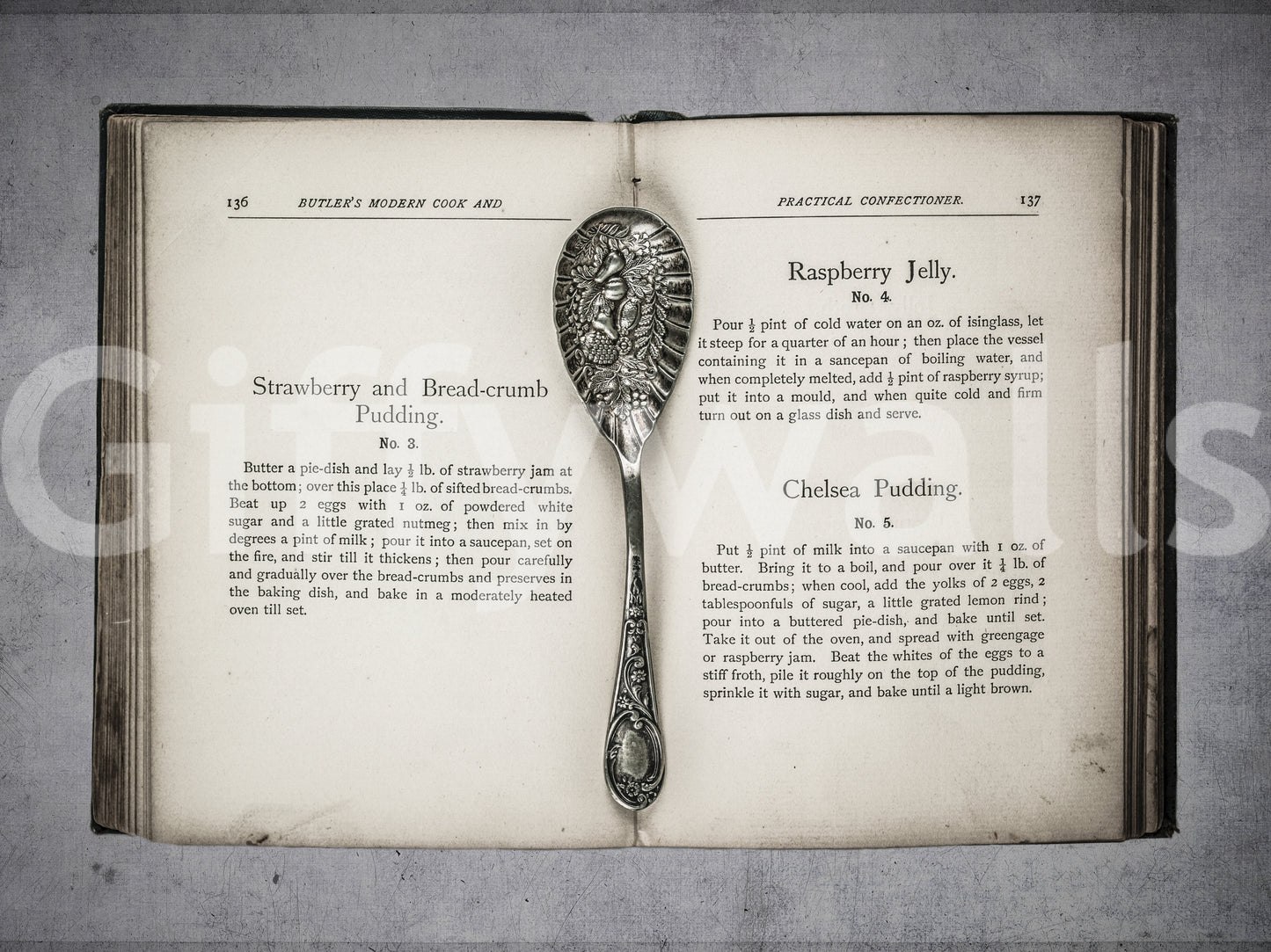 Culinary Antiques wall covering featuring worn book edges and silver details.