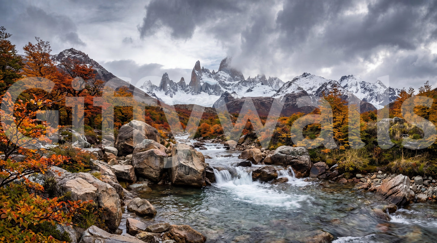 Alpine autumn cascade wall mural with rocky stream and snow peak backdrop