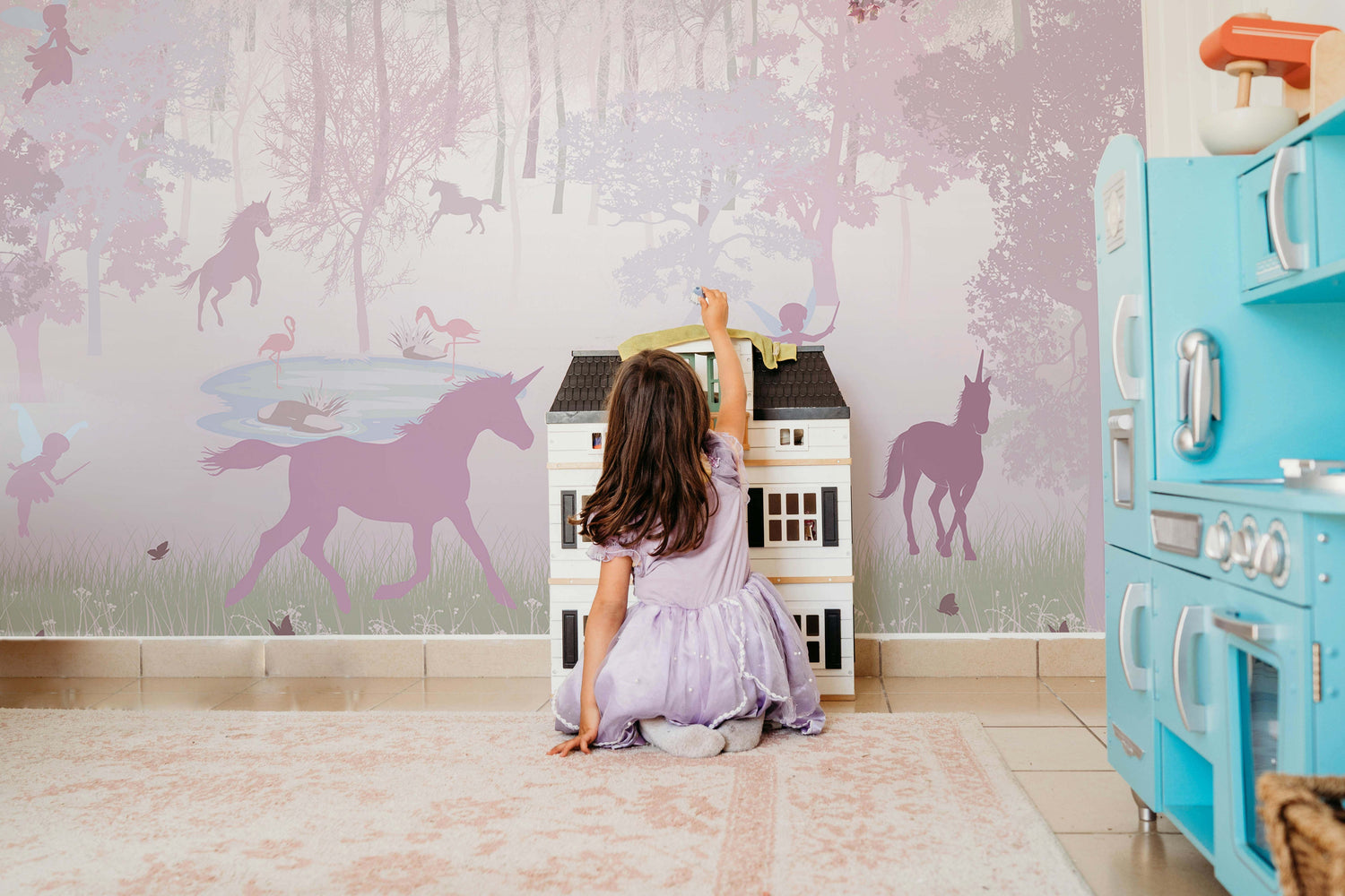 A collage of different pink, purple, and rainbow girls' wallpaper samples and patterns.