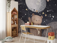 Enchanting wall mural with a bear, balloon, and night sky stars.
