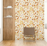 Abstract shapes and soft, blurred elements are present.
