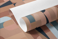 1970s Hex Dot Brown Color wallpaper shown as a rolled sample with geometric blocks in terracotta, navy and pale blue