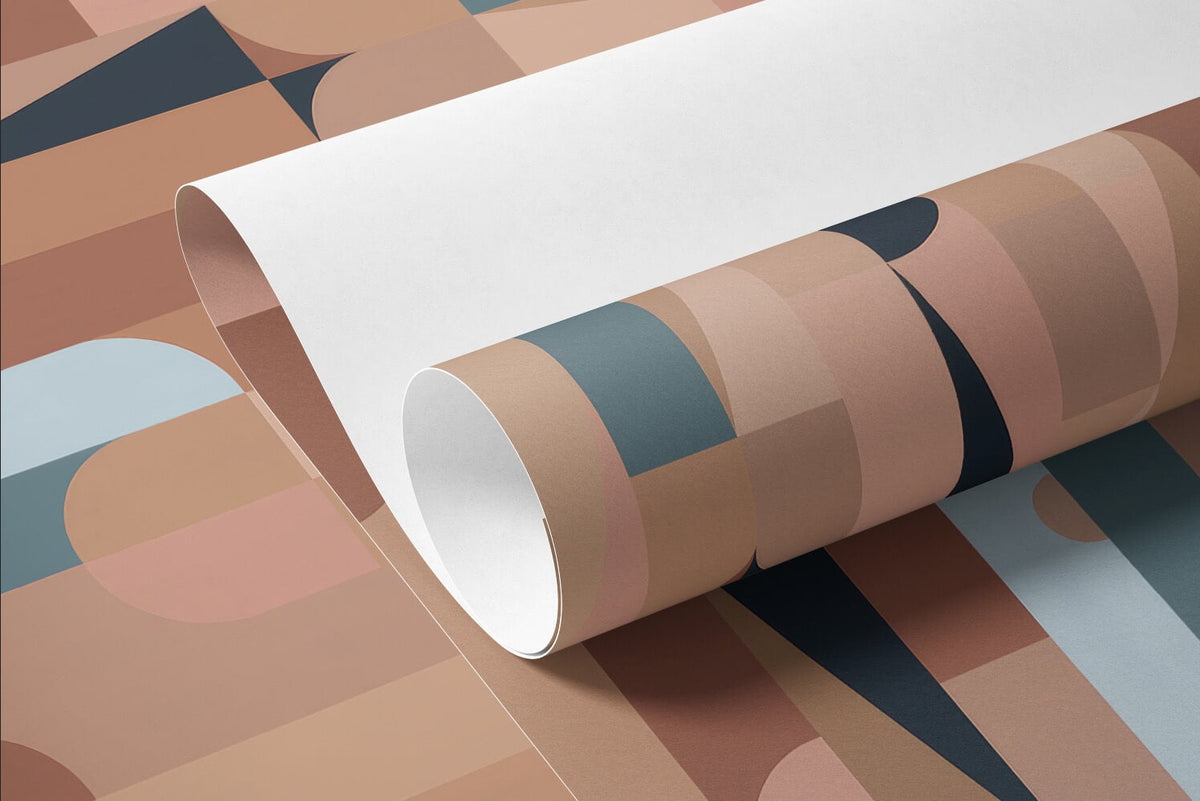 1970s Hex Dot Brown Color wallpaper shown as a rolled sample with geometric blocks in terracotta, navy and pale blue