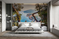 Coastal wall art featuring sea, villas, and greenery

