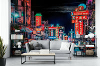 Bangkok street glowing with neon at night

