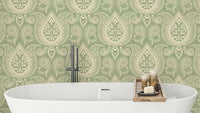 Sage green wallpaper with paisley botanical print

