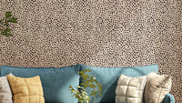 Bold brown and jewel jungle dot wallpaper for a wild look

