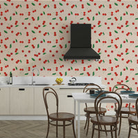 Hand-painted cherries tossed across soft-toned wallpaper

