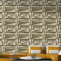 Olive green abstract mural wallpaper in dining area

