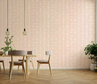 Feminine boho striped wallpaper in pink hues

