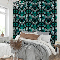 Boho-style floral wallpaper in muted blue tones

