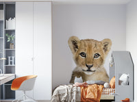 Cartoon baby lion wall art for children’s space

