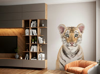 Jungle-themed baby tiger mural for kids’ decor

