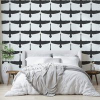 Soft gray wallpaper featuring a swan flock design

