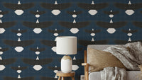 Bold blue wall design with soaring eagle illustrations

