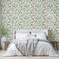 Hand-painted wild garden design on green wallpaper

