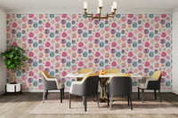 Playful watercolor dots wallpaper in pink tones

