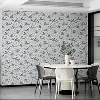 Nature-inspired robin design on blue wallpaper

