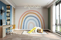 Trendy rainbow wallpaper accenting a cozy reading nook

