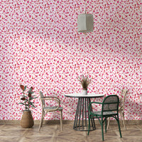Pink-red wallpaper with repeating heart illustrations


