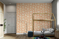 Abstract floral wallpaper in peach and cream tones

