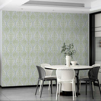 Green leaf damask wallpaper with intricate floral patterns

