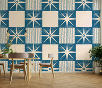 Clean retro starburst quilt block wallpaper in blue tones

