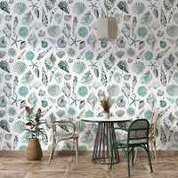Wallpaper featuring hand-drawn marine shells in calm blue tones.

