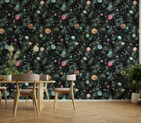 Space-inspired wallpaper with a rich blue backdrop and vibrant celestial elements.

