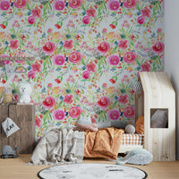Close-up of roses and nature elements in a vibrant, whimsical floral wallpaper.

