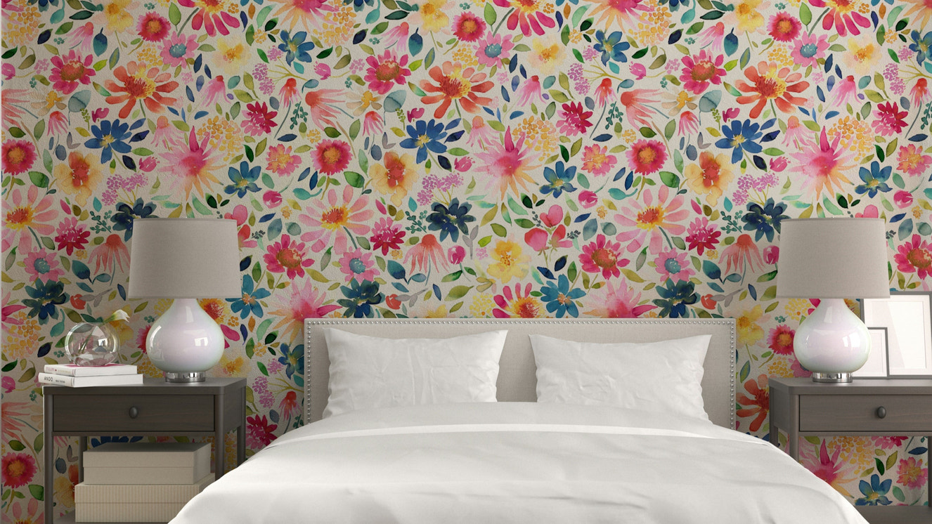 Floral wallpaper featuring vibrant zinnias in shades of pink, yellow, and orange.

