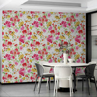 Wallpaper with fresh spring flowers in pink, yellow, and green.

