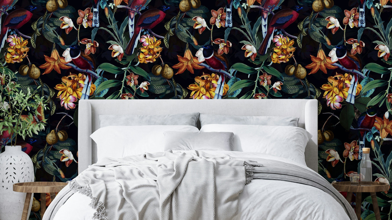 Dark tropical wallpaper bringing a serene, exotic atmosphere indoors

