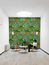 Lush tropical plants and bold emerald tones in wallpaper for walls

