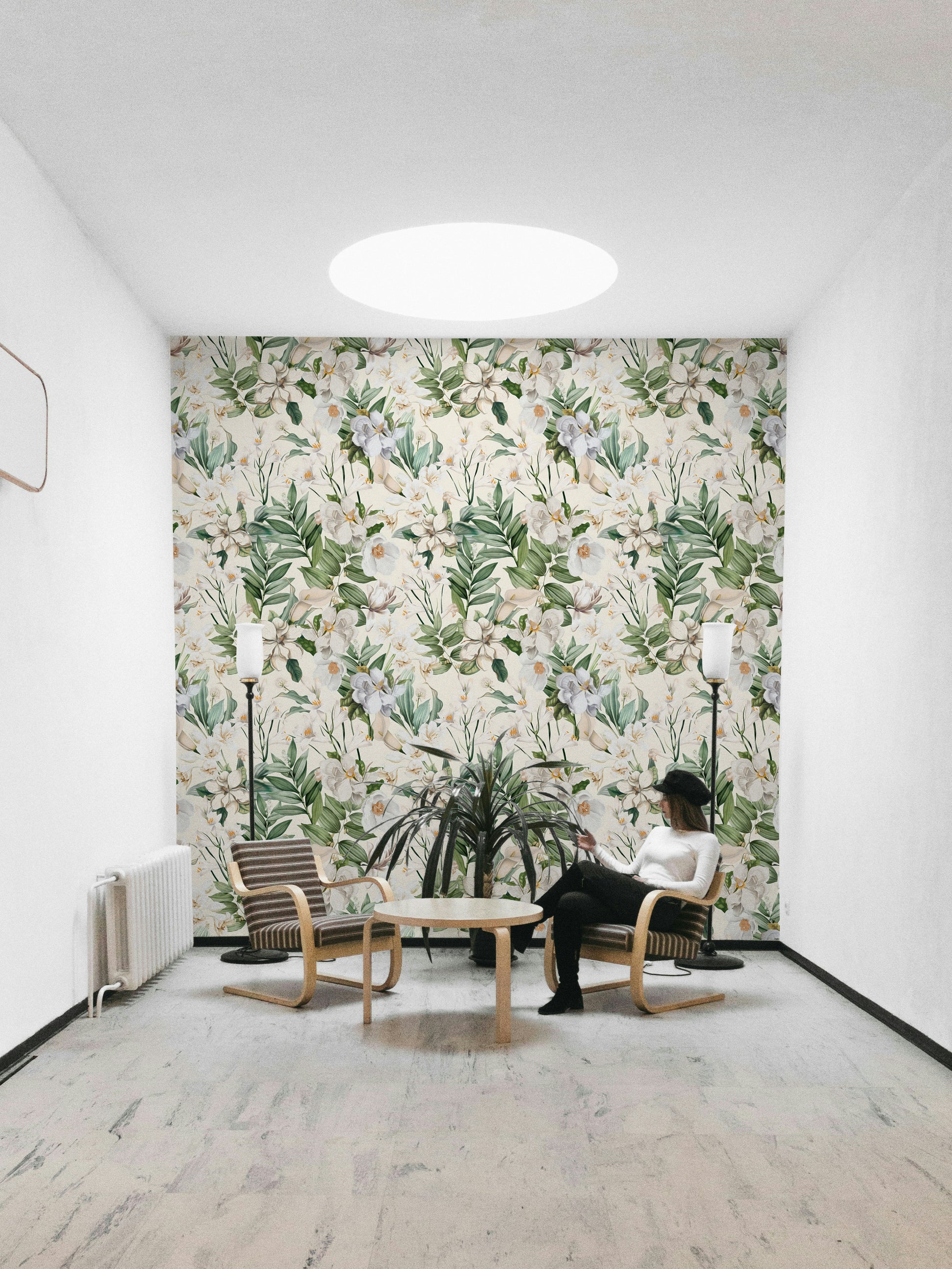 Close-up of Whimsical White Garden wallpaper featuring delicate vines.

