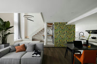 Jungle-inspired wallpaper featuring monkeys swinging through lush greenery.

