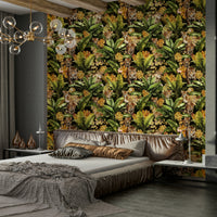 Luxurious jungle mural featuring gold highlights and vibrant green plants.


