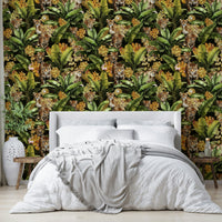 Wallpaper with jungle wildlife and golden foliage for an opulent feel.

