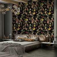 Vibrant tropical wallpaper with monkeys perched on branches and tropical blooms.


