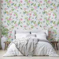 Vintage-inspired mural with garden creatures and floral trails.

