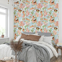 Vintage-inspired mural with cherubic figures and romantic florals.

