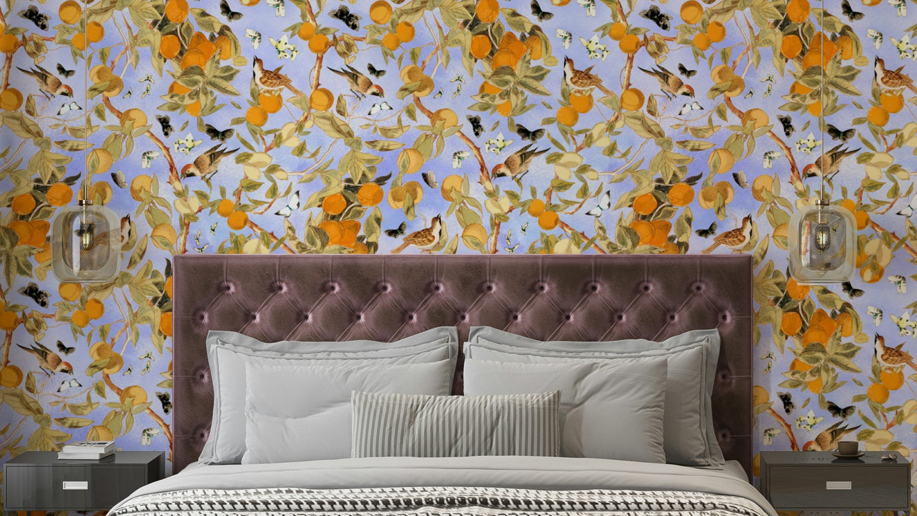 Cheerful wall mural with oranges, lemons, and soft botanical details.

