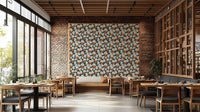 Blue wall mural featuring Mediterranean vineyard motifs.

