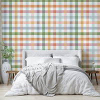 Wallpaper with a cheerful gingham design in soft spring and summer colors.

