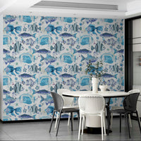 Tropical fish wallpaper perfect for beach-inspired rooms.

